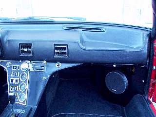 Instrumentpanelen p passagerarsidan i en tidig bil